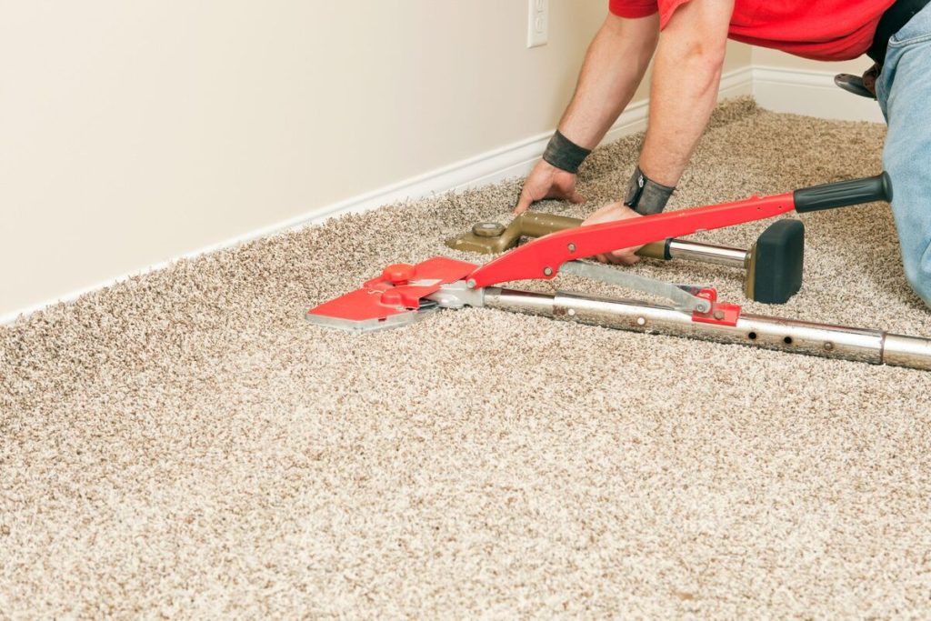 Carpet stretching in progress